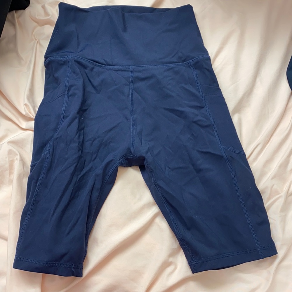 Dark blue biker shorts with pockets